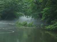 River with mist from weir